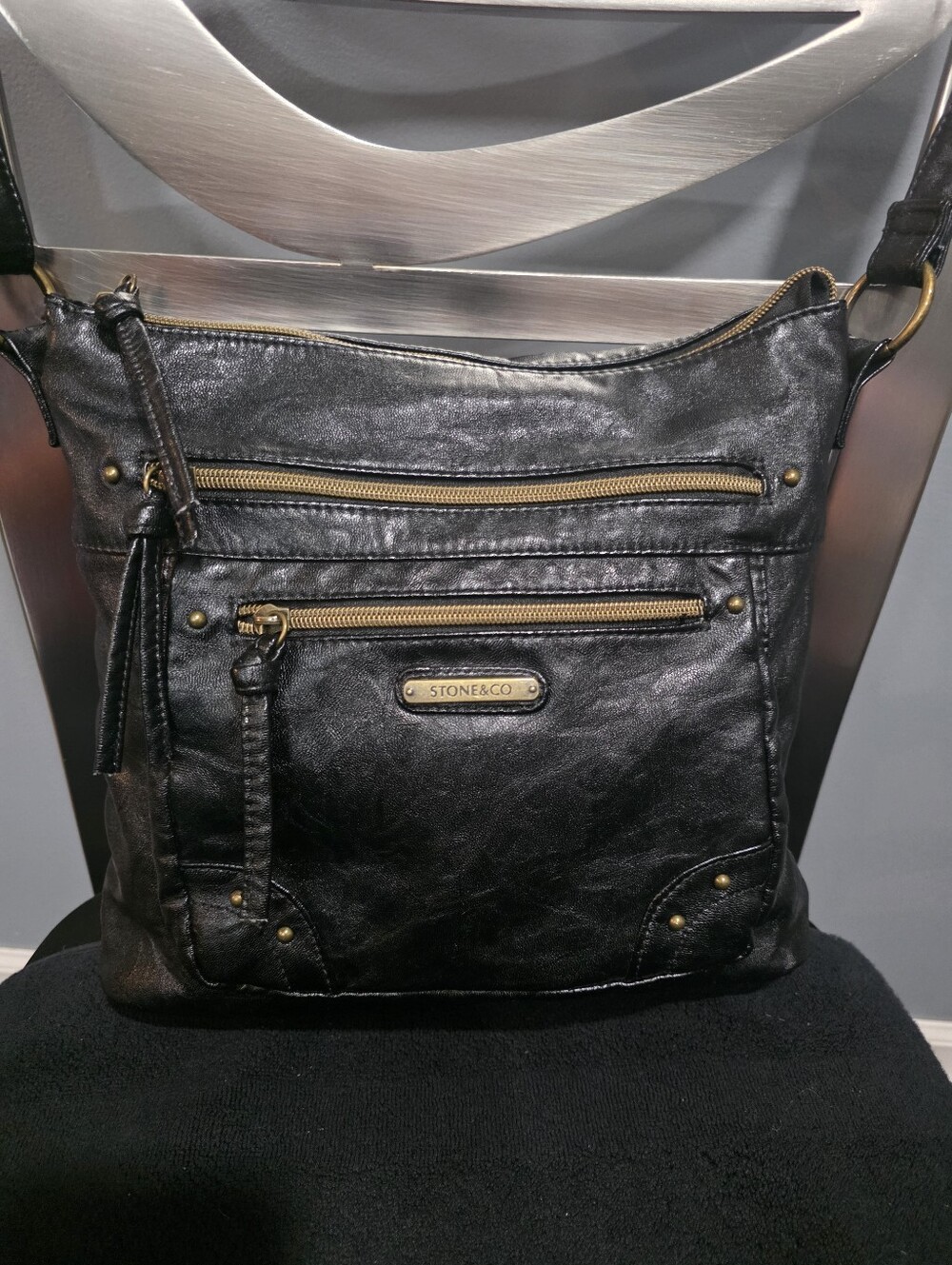 Stone & Co. Black Crossbody Bag with Brass Accents